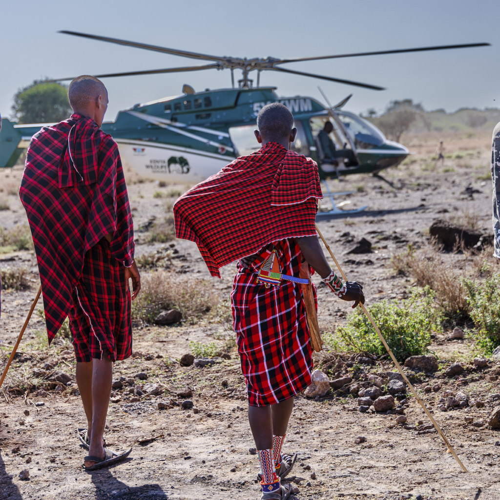 Maasai warriors kenya wildlife services helicopter